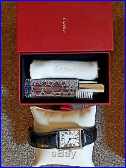 Cartier Tank Solo Watch, large with box, authenticity papers and Cartier Kit