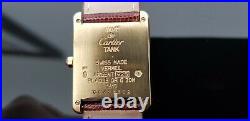 Must de Cartier Tank Gold on Silver Mid Size Watch in Cartier Red Suede Pouch