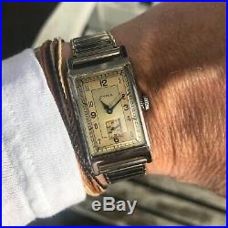 Stunning vintage 1940's swiss made 15J art deco Cyma stainless steel tank watch